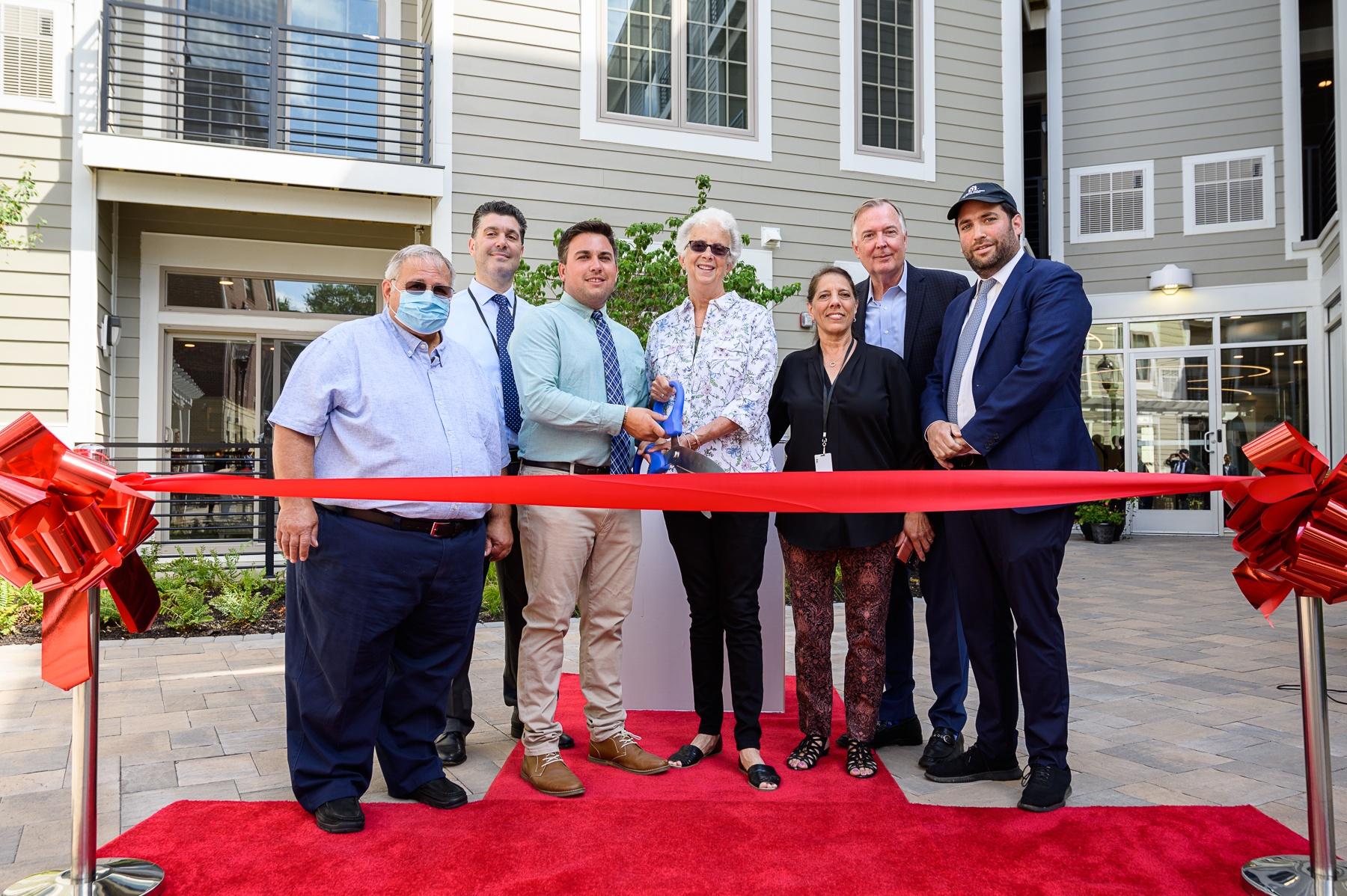Raritan Mayor Zachary Bray joins Accurate Builders and Developers to celebrate successful debut of Crossings at Raritan Station